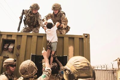 Four Americans Leave Afghanistan by Land in First Departures Since US Pullout