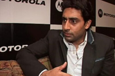 Fan chases Abhishek for an umbrella